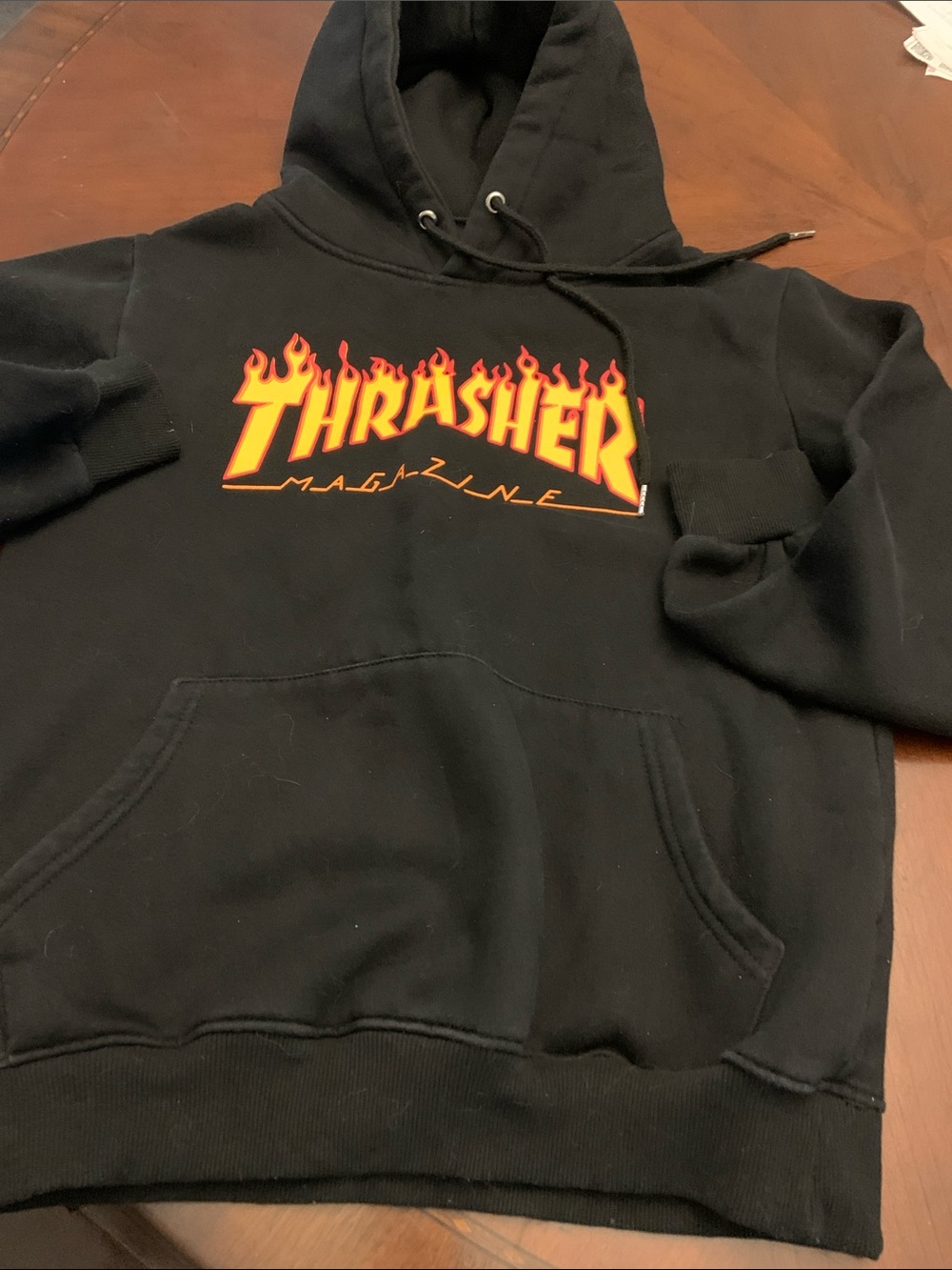Thrasher Black Hoodie with Orange-Yellow Flame Logo